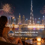 Solo traveller enjoying the vibrant New Year's Eve celebrations and fireworks in Dubai.